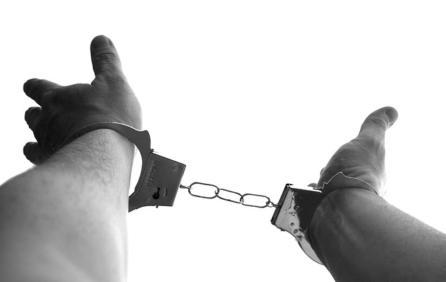 man in handcuffs after DUI offense